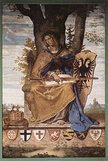  Germania'nın kucağında kılıçla oturan alegorik figürü (kadın, kılıç, dalgalı saç, dökümlü kaftan)